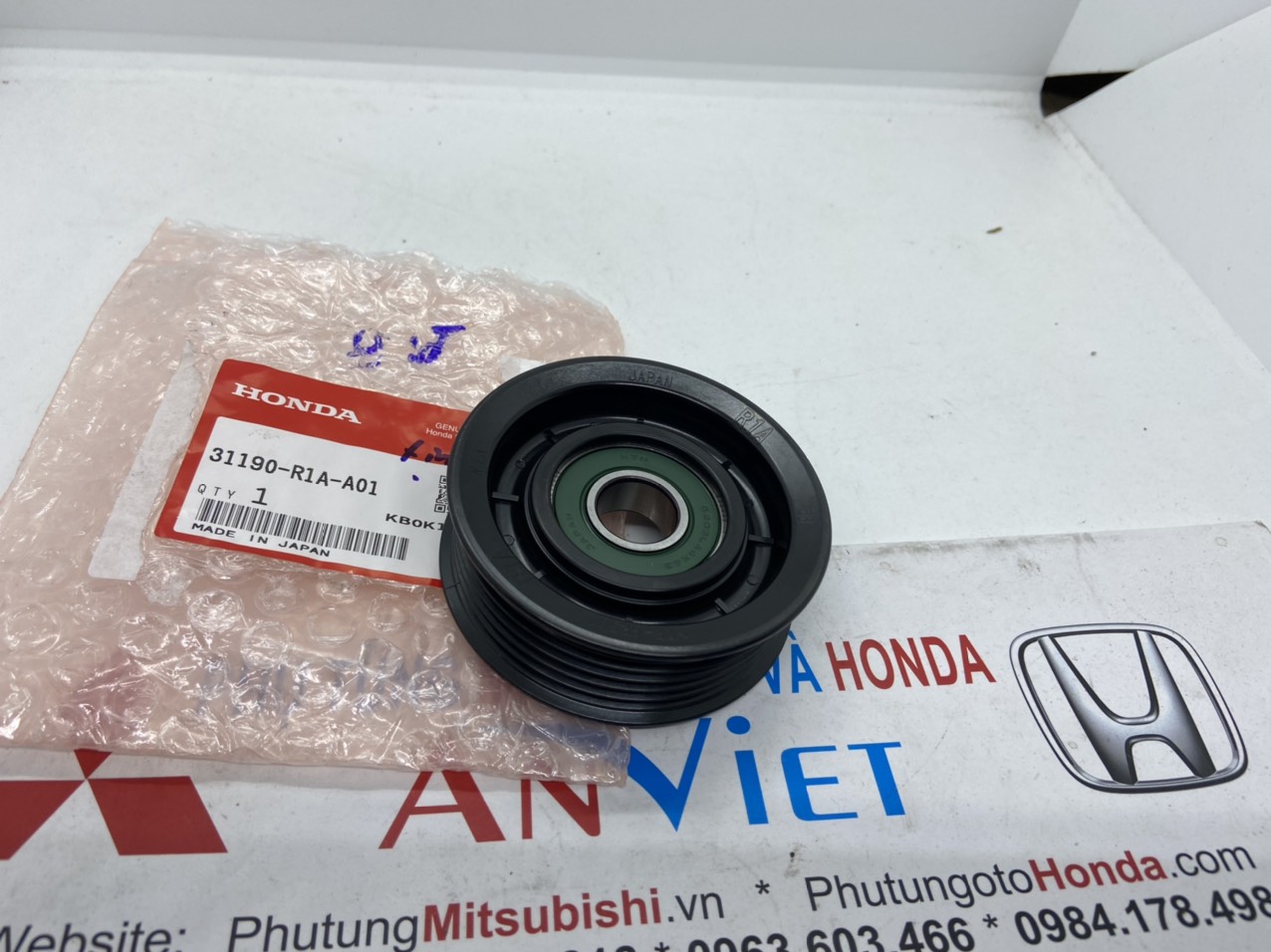 Bi tỳ dây máy phát xe Honda CRV 2013 